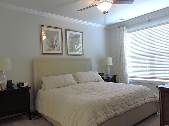 Carpeted bedroom featuring ornamental molding and a ceiling fan | Image 19