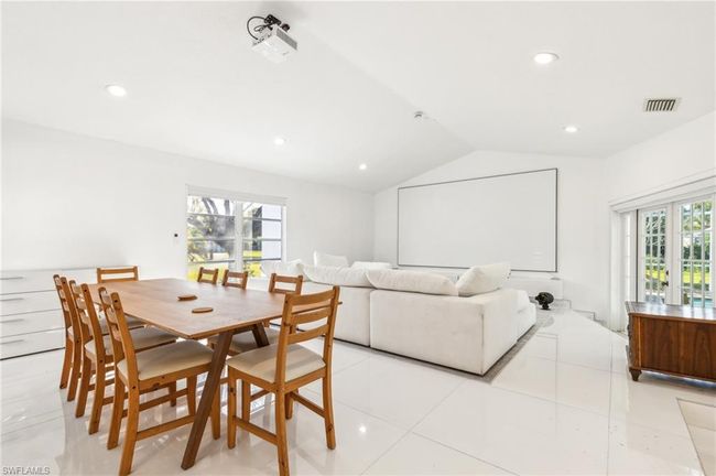 Dining room featuring visible vents, recessed lighting, light tile patterned floors, and vaulted ceiling | Image 17
