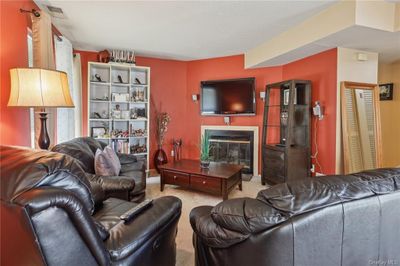 View of carpeted living room | Image 3