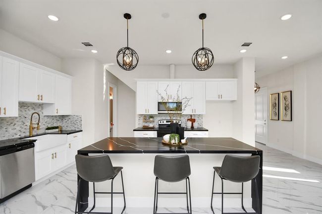 Waterfall Island allows for extra seating space. | Image 8