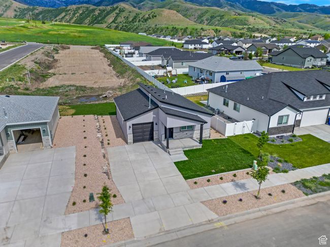 Aerial view of residential area featuring a mountain backdrop | Image 21