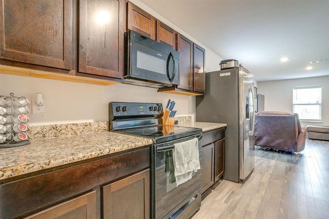 Kitchen looking out to living area | Image 16