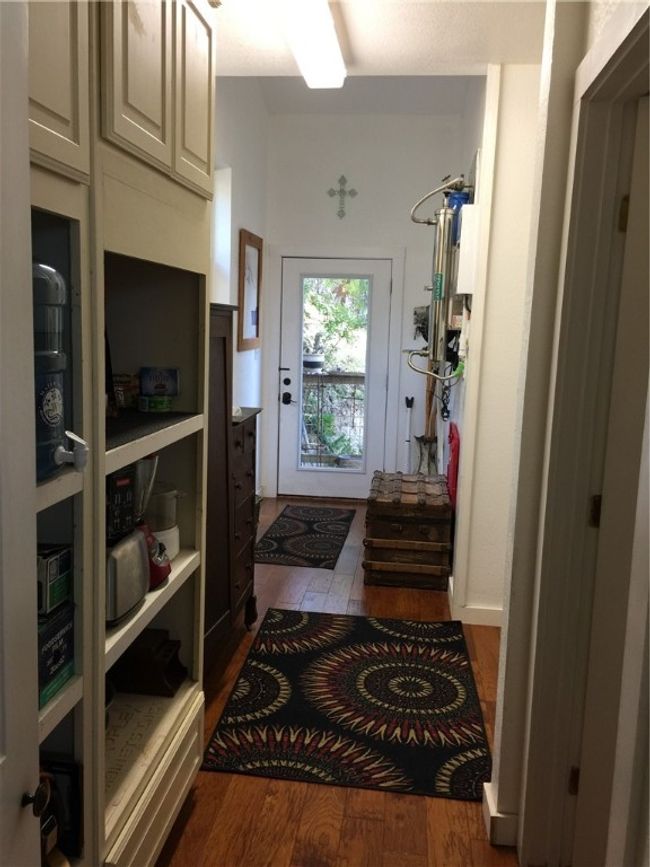 Pantry, laundry, half bath off kitchen | Image 10