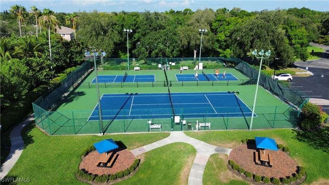 View of sport court with a lawn | Image 28