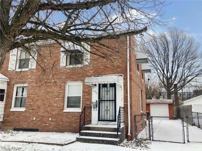 View of front of house featuring a garage | Image 2