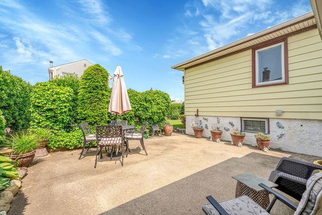 View of patio featuring outdoor dining space | Image 31