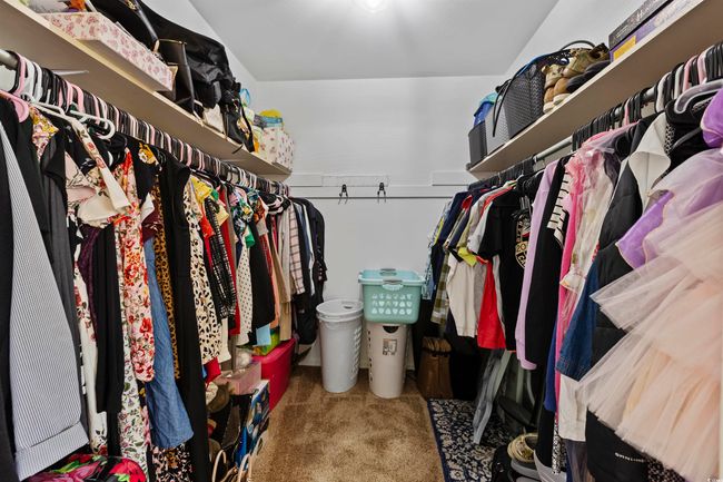 Spacious closet featuring carpet floors | Image 14