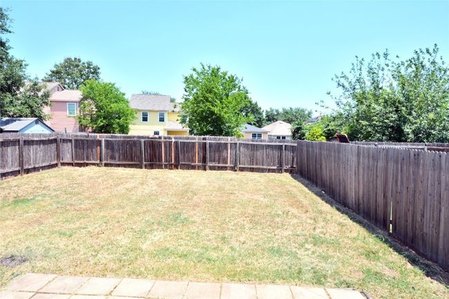 View of yard with a residential view | Image 20