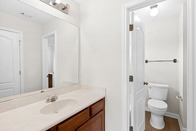 Bathroom with vanity and toilet | Image 20