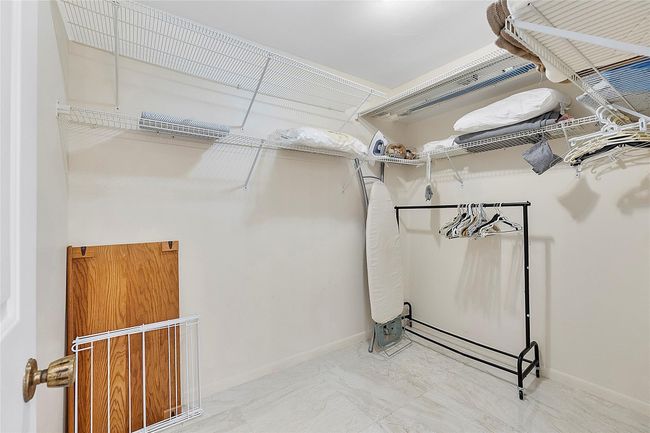 Large walk in closet in primary ensuite bedroom/bathroom | Image 28