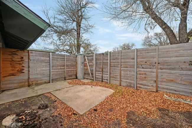 Fenced backyard featuring a patio | Image 5