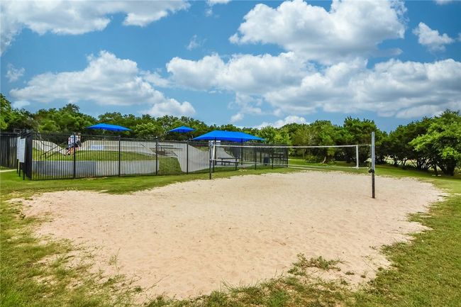 Take a break from the pool for a friendly game of beach volleyball. | Image 37