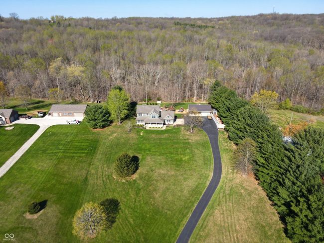 bird's eye view featuring a forest view | Image 37