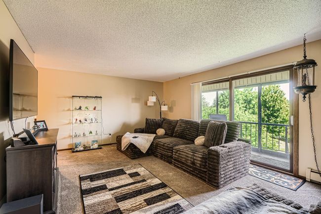 Living Room w/ sliding door to deck | Image 5