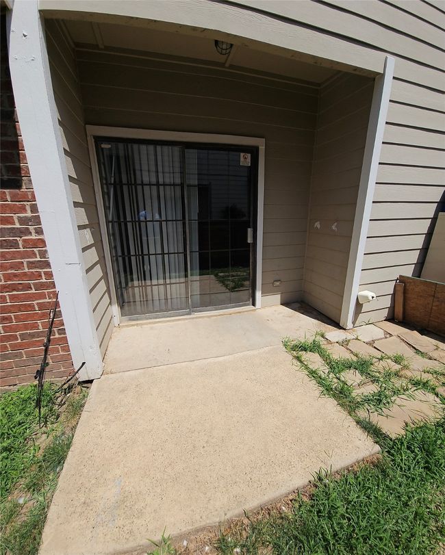 Property entrance with brick siding | Image 22