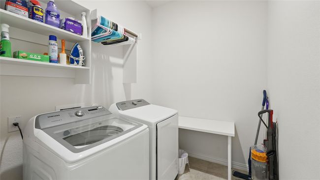 Washroom with washer and dryer and baseboards | Image 29