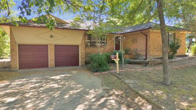 Single story home with a garage | Image 2