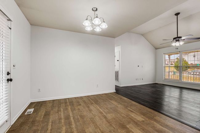 Dining area with new lighting fixture | Image 8