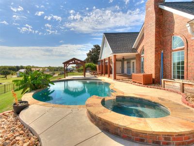 View of pool featuring a patio area | Image 3