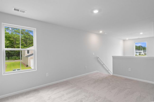 Empty room featuring baseboards, visible vents, and carpet floors | Image 10