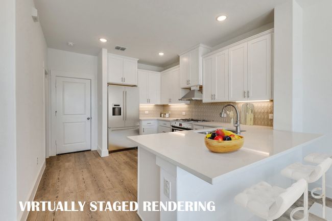 The kitchen peninsula offers a great place for a quick bite or homework station. VIRTUALLY STAGED RENDERING | Image 6