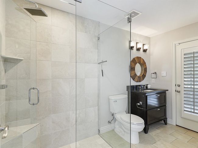 Full bathroom with a shower stall and vanity | Image 30
