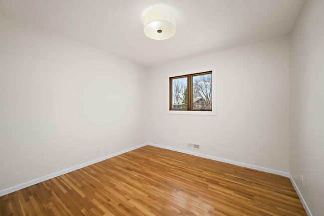 bedroom 3 on main floor with window replaced in 2024 | Image 21