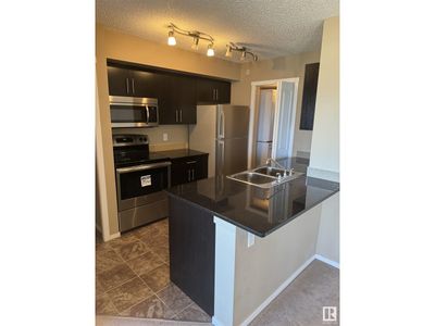 413 - 5810 Mullen Pl Nw, Condo with 2 bedrooms, 2 bathrooms and 1 parking in Edmonton AB | Image 2