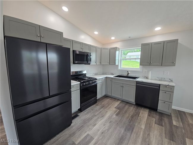 Enough room for island or table and chairs | Image 10
