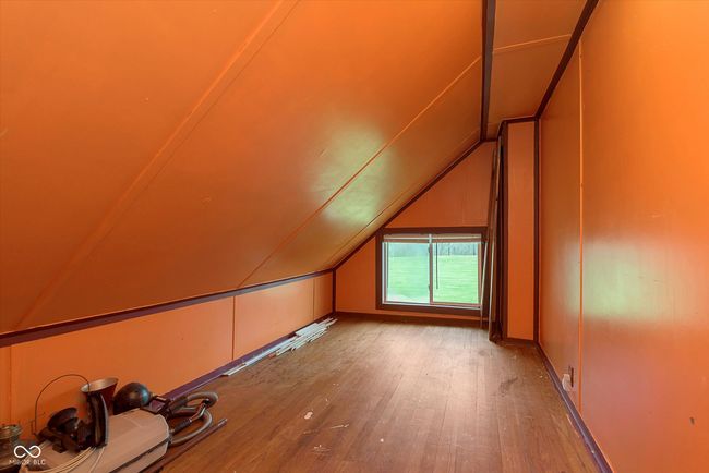bonus room featuring hardwood / wood-style floors and lofted ceiling | Image 21