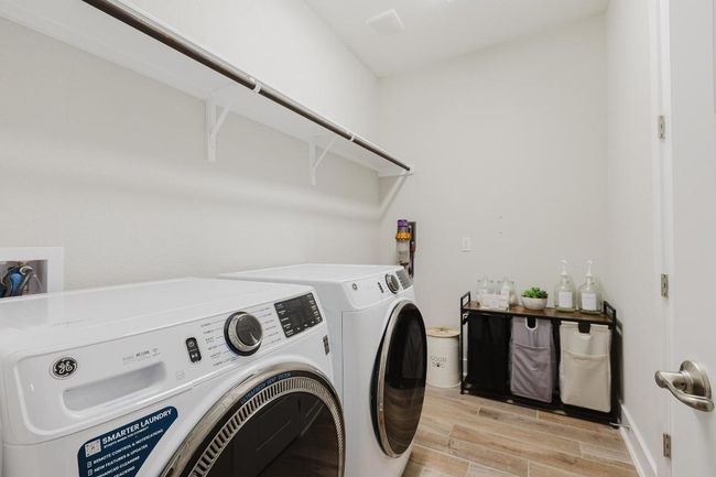 Spacious laundry room on main level | Image 21
