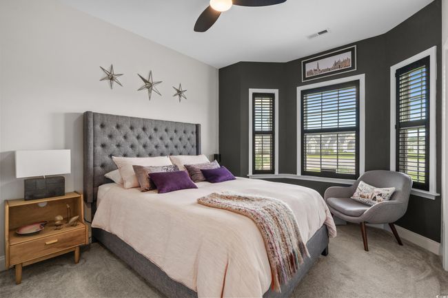 Bedroom featuring carpet floors and a ceiling fan | Image 21
