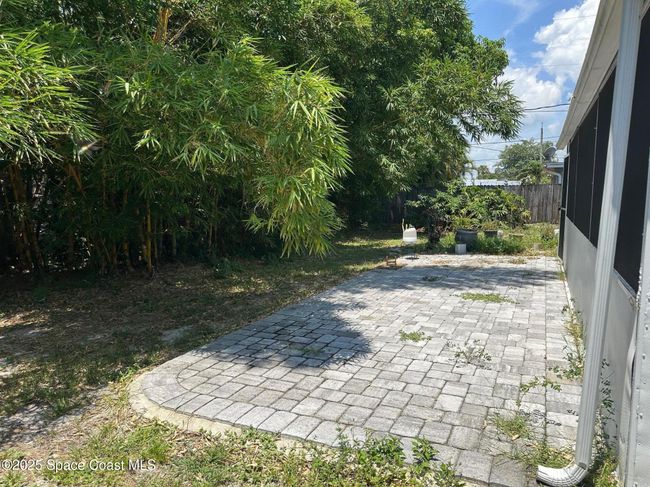 Paver Patio Outside of Screened Porch w/Fully Fenced Back Yard | Image 30