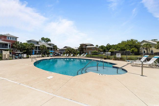 Community pool featuring a patio | Image 36