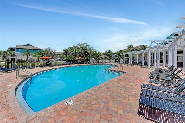 The Palms of Cortez community pool, pool deck, loungers. | Image 32