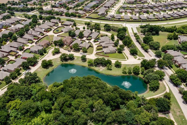 Aerial perspective of suburban area with a large body of water | Image 31