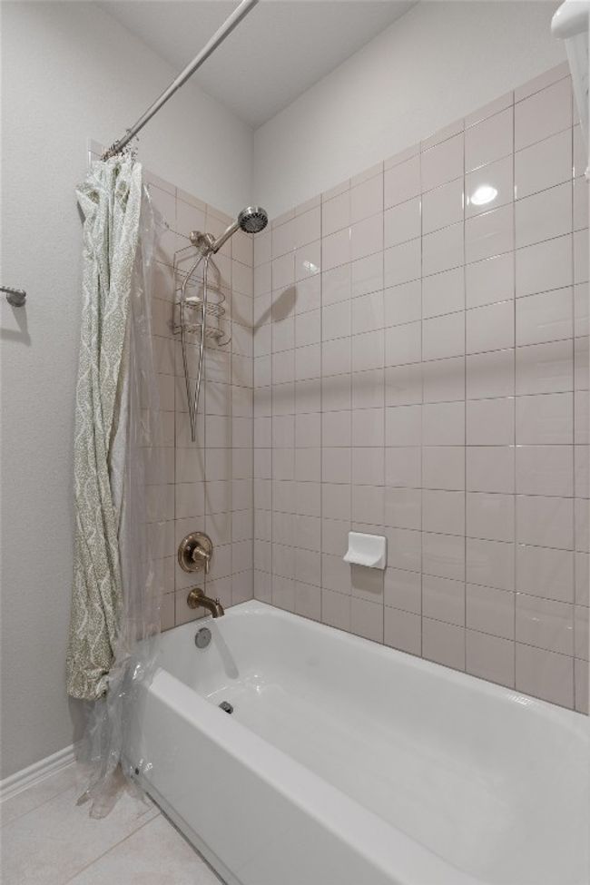 Bathtub/shower combo in the upstairs shared bathroom | Image 23