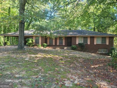 1880 Reynolds Road Sw, House other with 7 bedrooms, 3 bathrooms and null parking in SOUTH FULTON GA | Image 1