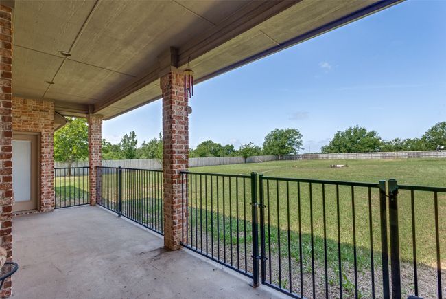 Covered back patio | Image 32