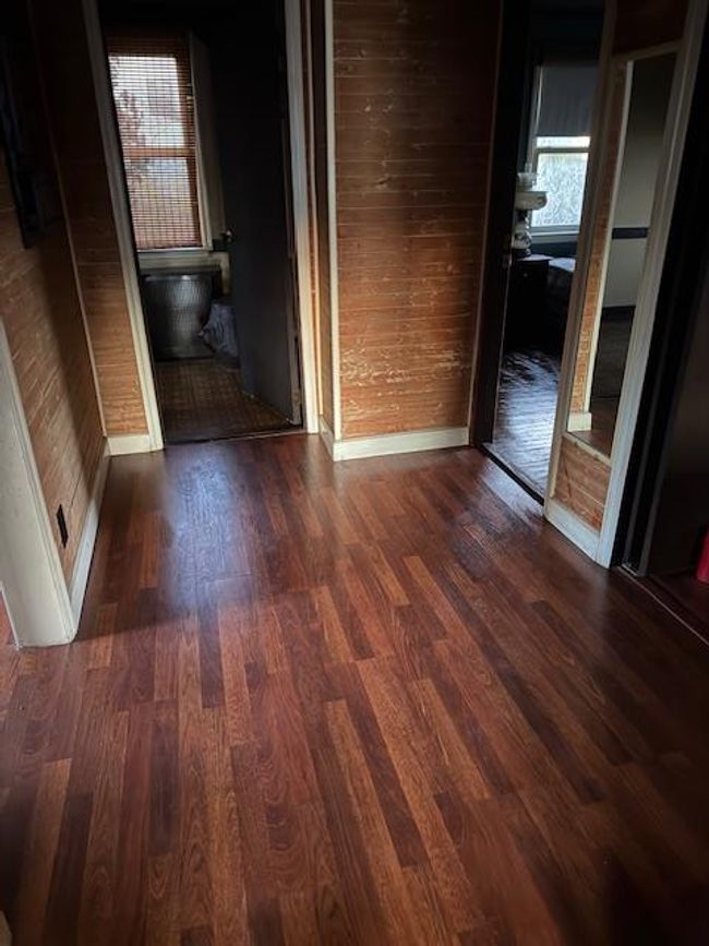 Hallway featuring dark wood-style floors | Image 19