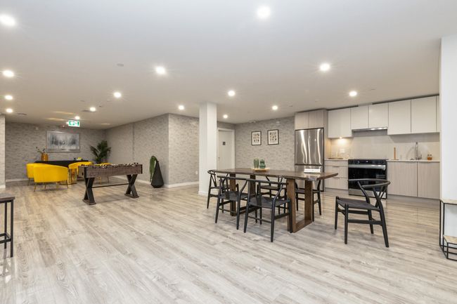 Dining space featuring light wood-type flooring, recessed lighting, and wallpapered walls | Image 20