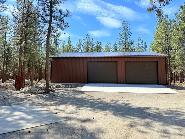 View of New detached garage, 2-14' doors with Garage Door Openers | Image 57