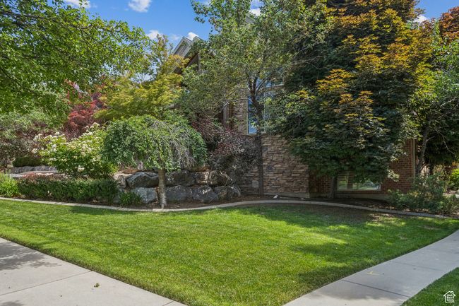 Surrounding community with a yard | Image 66