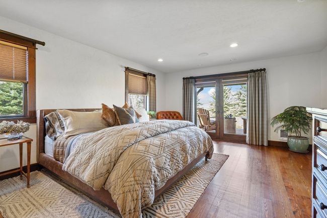 Main Floor, Spacious Primary Suite, French Doors accessing covered sitting area. | Image 29