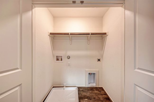 Washroom with gas dryer hookup, dark wood-style floors, electric dryer hookup, and washer hookup | Image 29