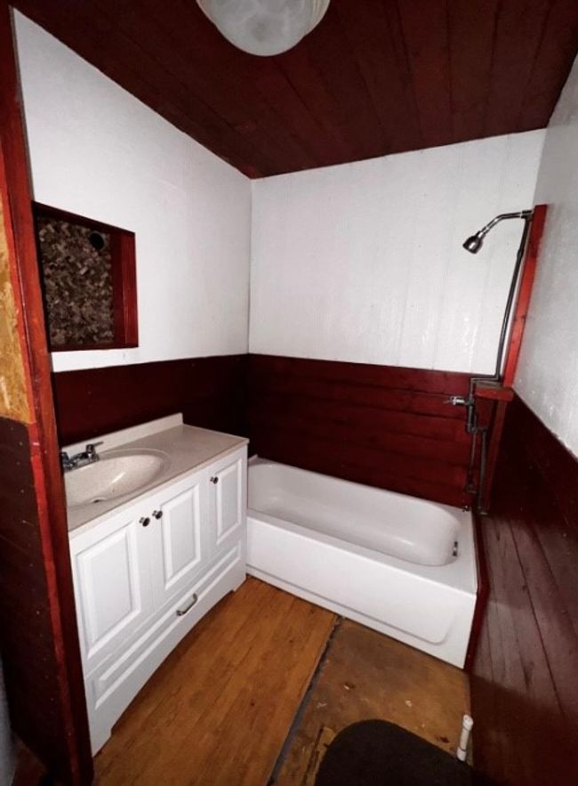 Full bathroom with vanity, wood finished floors, and wooden ceiling | Image 11