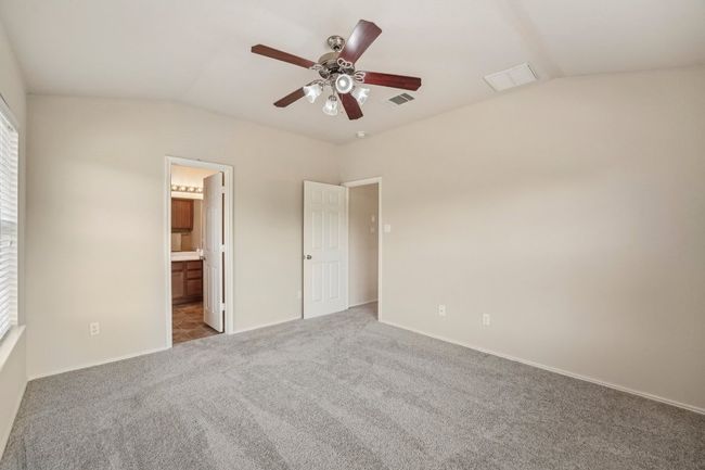 Tranquil Primary Suite – Spacious and serene, this bedroom is your personal retreat. | Image 21