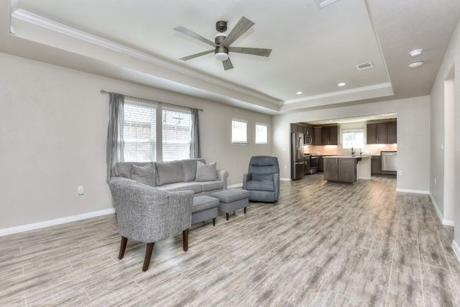 Wood-look tile throughout will be easy keeping. | Image 10