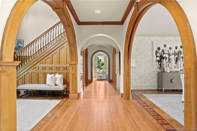 CUSTOM DETAILS // Gorgeous finishes including arches trimmed in quarter sawn oak, quarter sawn oak flooring and oak paneling. | Image 4