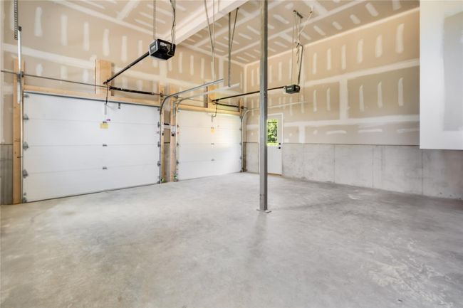Carpeted empty room with baseboards, ceiling fan, visible vents, and recessed lighting | Image 32